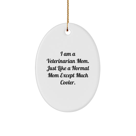 Gifts from Women to Veterinarian Mom, Veterinarian Christmas Unique Gifts, Oval Ornament with 'I Am A Veterinarian Mom. Just Like A Normal Mom Except Much Cooler.' Humorous Quote - Image 1