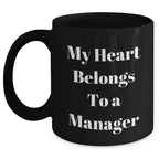 Funny Manager Gifts from Friends, My Heart Belongs To A Manager, Unique Graduation Mugs for Him, Her, Coworkers, Family, Ceramic Black Coffee Mug, 11oz or 15oz, Microwave and Dishwasher Safe