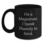 Funny Magistrate Gifts - I'm A Magistrate. I Speak Fluently In genius. Black Coffee Mug for Him, Ideal Gift Ideas for Magistrate Friends and Family at Christmas