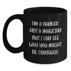 Funny Banker Gifts from Friends for Men, 'I'm A Banker. Not A Magician But I Can See Why You Might Be Confused.' Unique Black Coffee Mug for Christmas