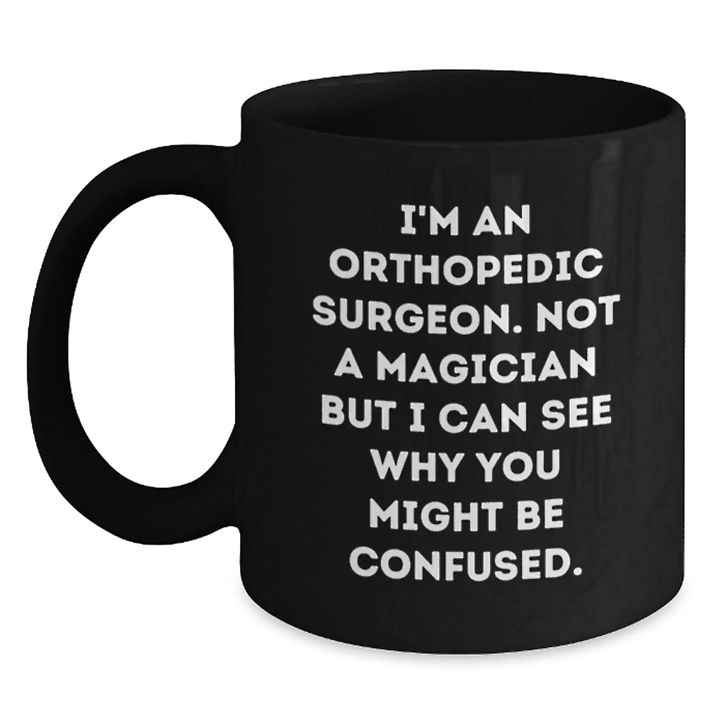 Funny Orthopedic Surgeon Gifts - 'I'm Not A Magician But I Can See Why You Might Be Confused' Birthday Mug for Orthopedic Surgeon Doctors, Unique Black Coffee Mug from Friends - Main