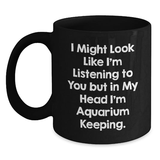 Funny Aquarium Keeping Mug Gifts from Friends and Family for Christmas Unique Gifts - 'I Might Look Like I'm Listening To You But In My Head I'm Aquarium Keeping.' Black Coffee Mug - Main