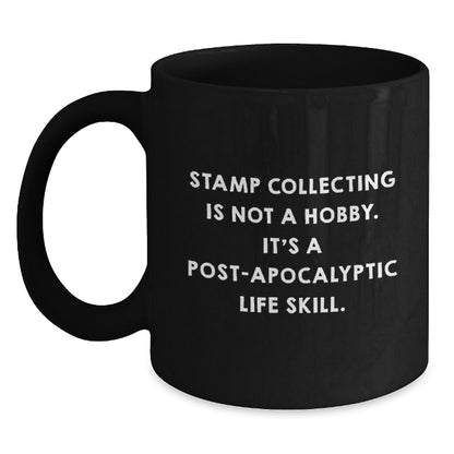 Funny Stamp Collecting Gifts for Men, Women, Friends, Coworkers, Family - Graduation Unique Gifts from 'Stamp Collecting Is Not A Hobby. It's A Post-apocalyptic Life Skill.' Quote on Black Coffee Mug - Main