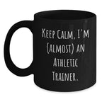 Funny Athletic Trainer Black Coffee Mug, 'Keep Calm, I'm (almost) An Athletic Trainer.' Gifts for Athletic Trainers from Friends and Family