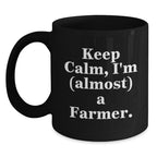 Funny Farm-Themed Gifts for Farmer Men, Women, and Friends - Black Ceramic Coffee Mug - Keep Calm, I'm (almost) A Farmer.