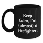 Funny Firefighter Christmas Unique Gifts from Friends and Family, Black Coffee Mug, 'Keep Calm, I'm (almost) A Firefighter.'