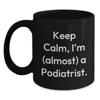 Funny Podiatrist Gifts from Friends, Unique Black Coffee Mug for Christmas Unique Gifts, 'Keep Calm, I'm (almost) A Podiatrist.'