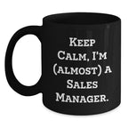 Funny Sales Manager Gifts from Friends - Keep Calm I'm (almost) A Sales Manager. Black Ceramic Coffee Mug for Birthday