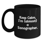 Funny Sonographer Gifts, 'Keep Calm, I'm (almost) A Sonographer.' Black Coffee Mug for Birthday, Gifts from Friends to Sonographer