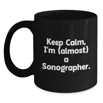 Funny Sonographer Gifts, 'Keep Calm, I'm (almost) A Sonographer.' Black Coffee Mug for Birthday, Gifts from Friends to Sonographer - Main