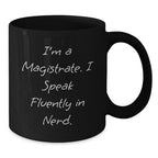 Funny Magistrate Gifts for Him - I'm A Magistrate. I Speak Fluently In genius. Black Coffee Mug, Perfect for Magistrate Enthusiasts, Unique Christmas Unique Gifts from Men to Men