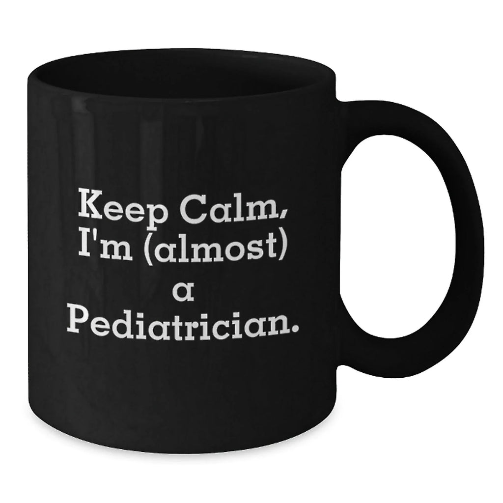Funny Pediatrician Gifts for Christmas - Keep Calm, I'm (almost) A Pediatrician Black Coffee Mug - Gifts from Family to Men