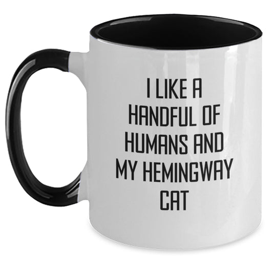 Funny Hemingway Cat Gifts - I Like A Handful Of Humans And My Hemingway Cat, Two Tone Coffee Mug for Birthday from Men to Women - Main