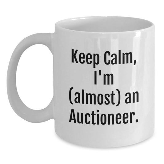 Funny Auctioneer Gifts, Keep Calm I'm (almost) An Auctioneer, White Coffee Mug for Birthday from Friends, Coworkers, Family - Main