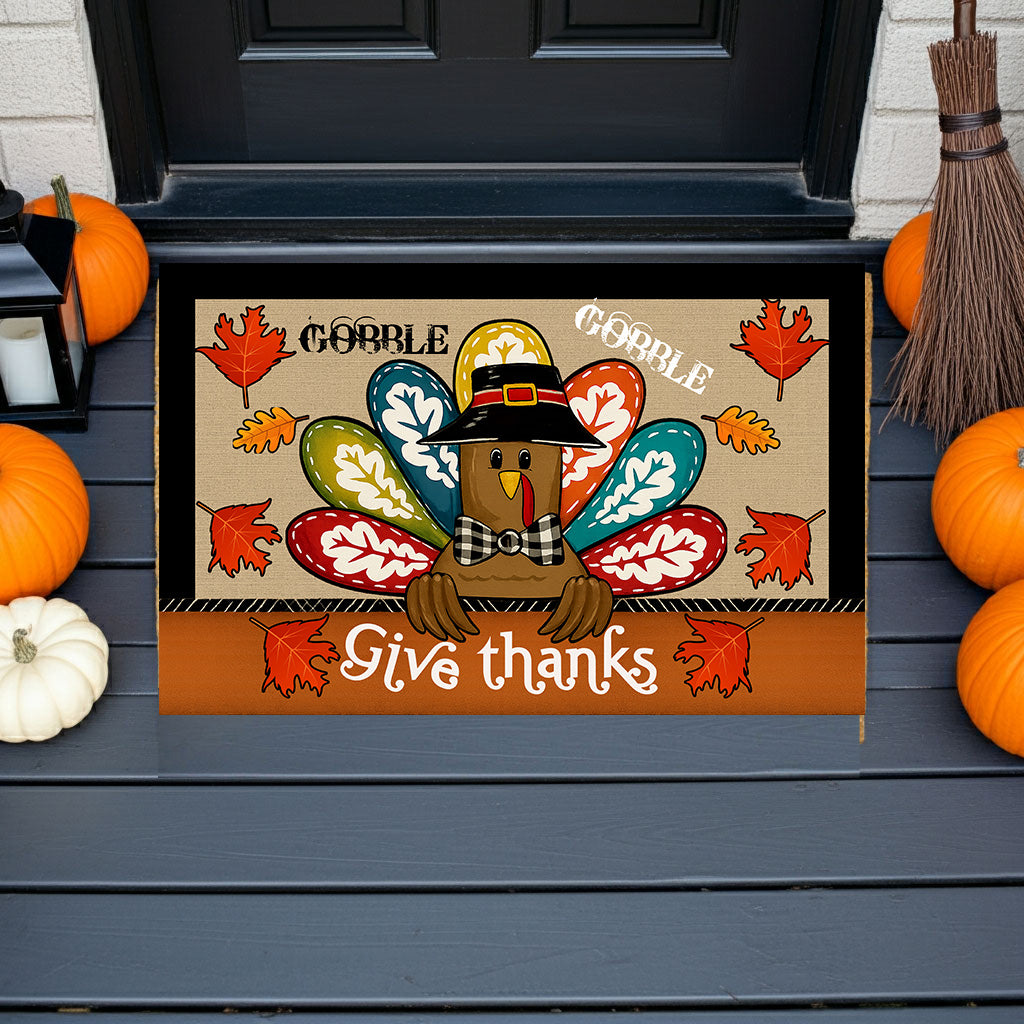 Colorful Turkey Thanksgiving Doormat – “Give Thanks” Fall Welcome Mat with Gobble Design, Autumn Leaves & Farmhouse Plaid Accent for Porch or Entryway Décor