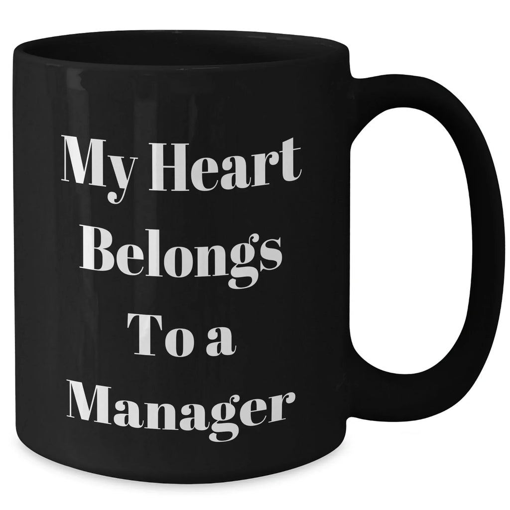 Funny Manager Gifts from Friends, My Heart Belongs To A Manager, Unique Graduation Mugs for Him, Her, Coworkers, Family, Ceramic Black Coffee Mug, 11oz or 15oz, Microwave and Dishwasher Safe