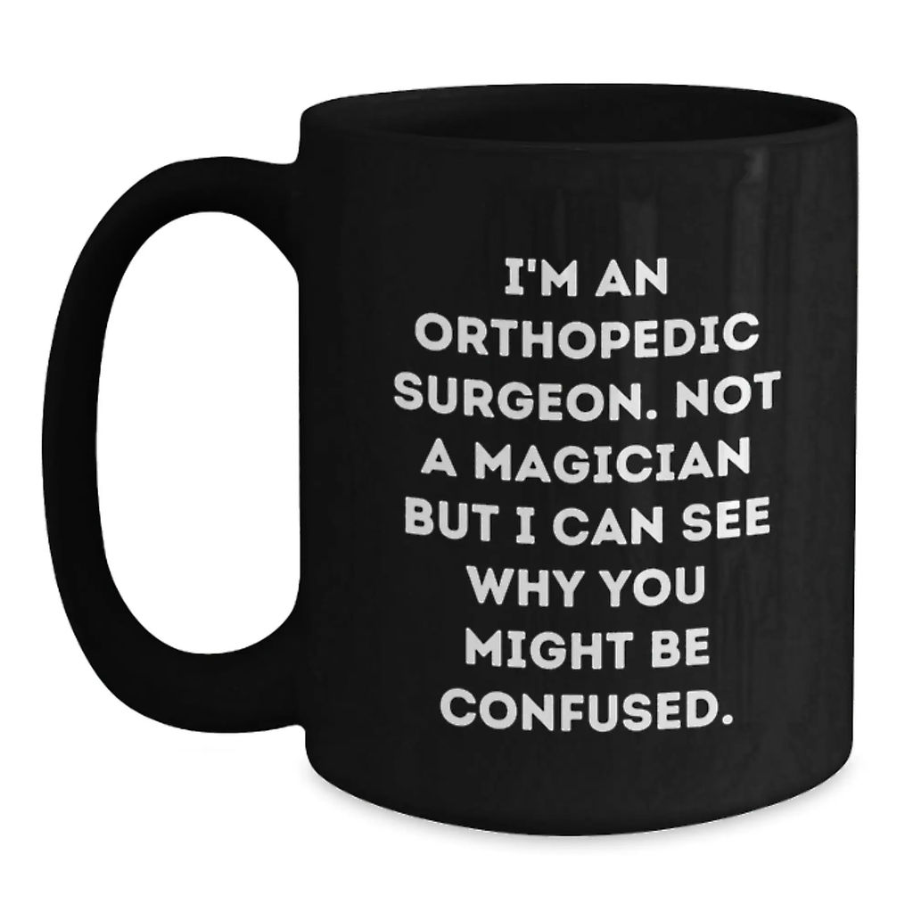 Funny Orthopedic Surgeon Gifts - 'I'm Not A Magician But I Can See Why You Might Be Confused' Birthday Mug for Orthopedic Surgeon Doctors, Unique Black Coffee Mug from Friends - Main