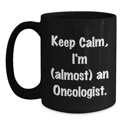 Funny Oncologist Gifts from Friends for Men Women - Keep Calm I'm almost An Oncologist Black Coffee Mug, Unique Christmas Unique Gifts for Oncologist Family and Coworkers - Main