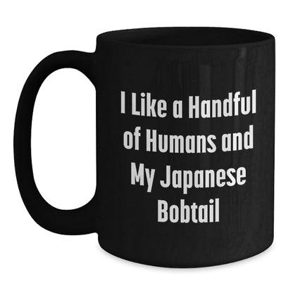 Funny Japanese Bobtail Cat Lover Gifts from Friends and Family, I Like A Handful Of Humans And My Japanese Bobtail, Black Coffee Mug, Christmas Unique Gifts for Japanese Bobtail Cat Enthusiasts - Main