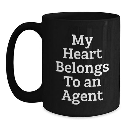 Agent Lovers Funny Gifts from Friends for Birthday - 'My Heart Belongs To An Agent' Black Coffee Mug, 11oz or 15oz, Microwave and Dishwasher Safe - Main
