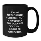 Funny Orthopedic Surgeon Gifts - 'I'm Not A Magician But I Can See Why You Might Be Confused' Birthday Mug for Orthopedic Surgeon Doctors, Unique Black Coffee Mug from Friends - Additional