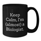 Funny Biologist Gifts - Keep Calm, I'm (almost) A Biologist. Black Coffee Mug for Biologist Friends on Christmas