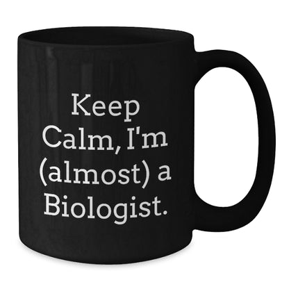 Funny Biologist Gifts - Keep Calm, I'm (almost) A Biologist. Black Coffee Mug for Biologist Friends on Christmas - Additional