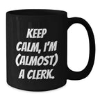 Funny Clerk Gifts for Men - Keep Calm, I'm Almost a Clerk Christmas Unique Mug, Black Coffee Mug for Clerks at Work