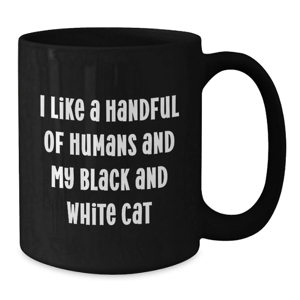 I Like a Handful of Humans and My Black and White Cat Mug – Funny Cat Lover Gift – Black Ceramic Coffee Cup