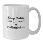 Funny Gift for Pediatrician Men White Coffee Mug Keep Calm I'm (almost) A Pediatrician.
