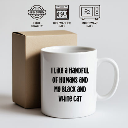 Funny Black and White Cat Gifts from Family for Birthday - I Like A Handful Of Humans And My Black And White Cat White Coffee Mug