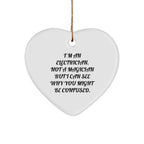 Funny Electrician Heart Ornaments, 'I'm An Electrician. Not A Magician But I Can See Why You Might Be Confused.'