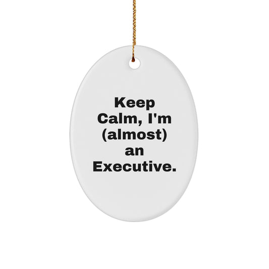 Funny Executive Gifts for Men, Oval Ornament, 'Keep Calm, I'm (almost) An Executive.', Christmas Unique Gifts from Friends - Image 1