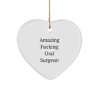 Funny Oral Surgeon Gifts from Friends - 'Amazing F--king Oral Surgeon' Heart Ornament for Christmas, Gifts for Oral Surgeon, Heart Shaped, White, 2.75'' tall, 0.5 oz, Durable MDF, High-Gloss Finish