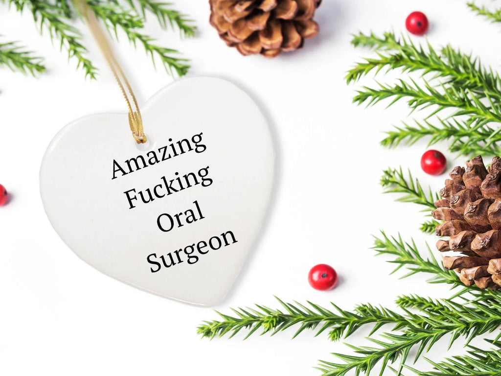 Funny Oral Surgeon Gifts from Friends - 'Amazing F--king Oral Surgeon' Heart Ornament for Christmas, Gifts for Oral Surgeon, Heart Shaped, White, 2.75'' tall, 0.5 oz, Durable MDF, High-Gloss Finish