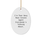 Funny Real Estate Agent Gifts from Men to Friends for Christmas Unique Oval Ornament 'I'm That Sexy Real Estate Agent Everybody's Talking About.'