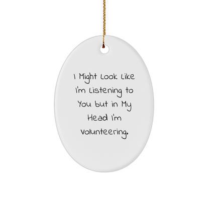 Funny Volunteering Gifts from Friends for Christmas - 'I Might Look Like I'm Listening To You But In My Head I'm Volunteering.' Oval Ornament