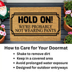 Funny “Hold On! We’re Probably Not Wearing Pants” Coir Doormat – Hilarious Welcome Mat | Humor Front Porch Decor | Gag Gift for Friends & Couples