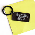 Funny Postmaster Gifts from Friends for Men - Keychain with Quote 'Sorry This Guy Is Already Taken By A Smokin' Hot Postmaster' for Father's Day