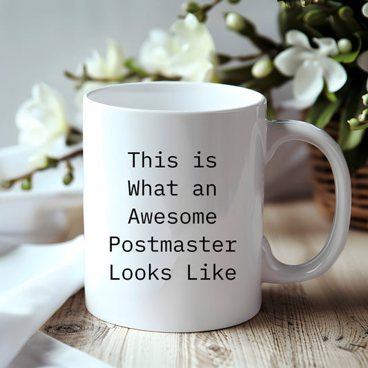 Funny Gifts for Postmaster - 'This Is What An Awesome Postmaster Looks Like' White Coffee Mug for Graduation, Made from Ceramic, Microwave and Dishwasher Safe, Gifts from Friends to Family