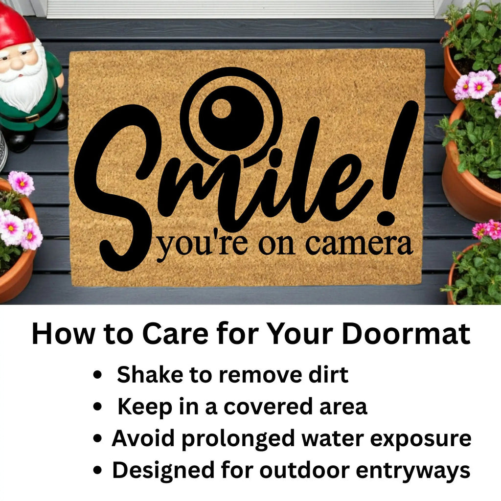 Funny Security Doormat - Smile! You’re on Camera | Coir Welcome Mat for Home Surveillance | Humorous Front Porch Décor