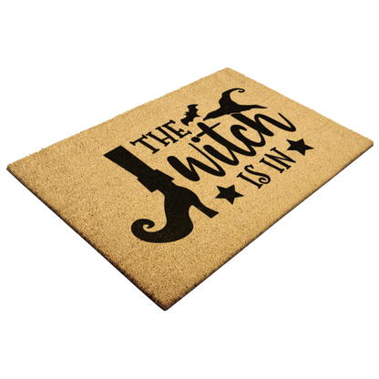 The_Witch_Is_In_Doormat__Funny_Witch__Outdoor_Mat_Angle_Mockup.png