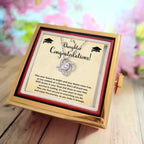 To My Daughter – Graduation Gift - Love Knot Necklace with Rotating Rose Jewelry Box