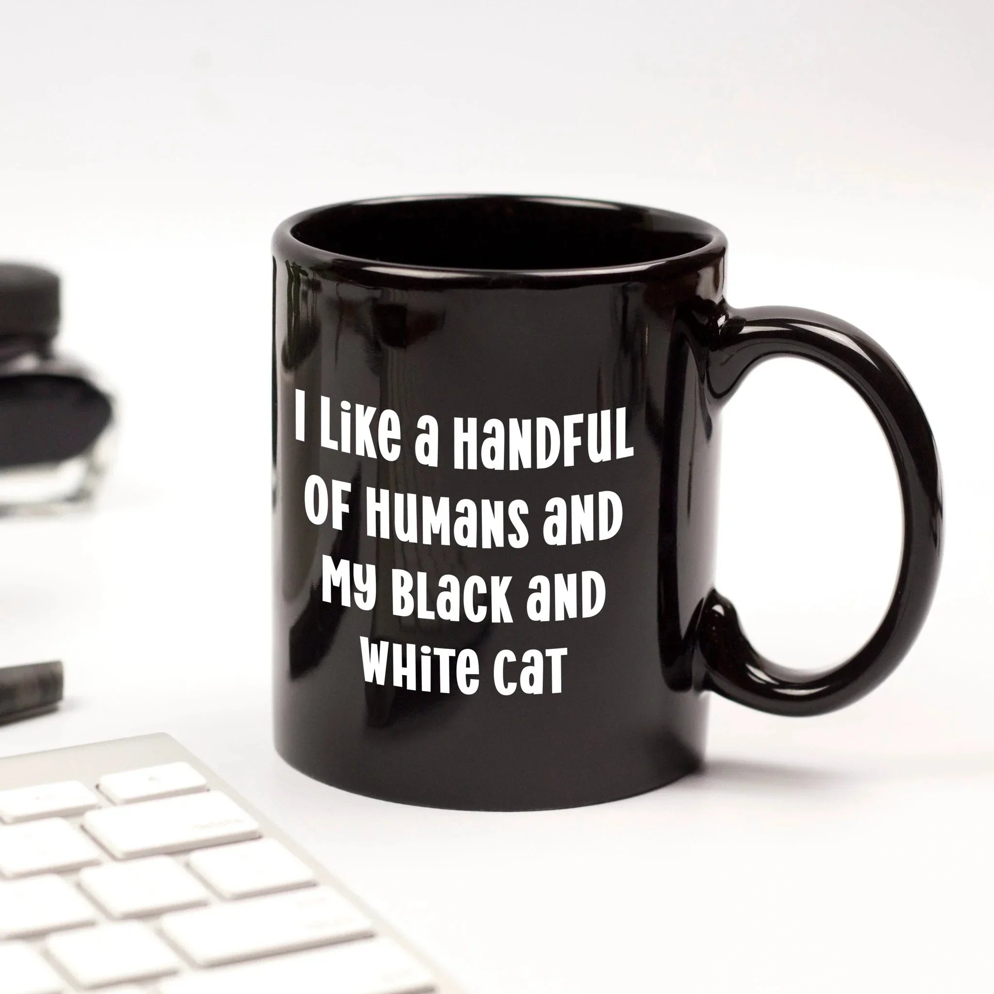 I Like a Handful of Humans and My Black and White Cat Mug – Funny Cat Lover Gift – Black Ceramic Coffee Cup