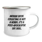 Antique Book Collecting Gifts for Friends, Women, and Family - 'Antique Book Collecting Is Not A Hobby. It's A Post-apocalyptic Life Skill.' Enamel Camping Mug for Graduation