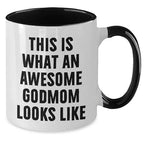This Is What an Awesome Godmom Looks Like – Funny Two-Tone Ceramic Coffee Mug Gift for Godmothers, Cute and Bold Present from Godchild for Birthday, Mother’s Day, or Just Because