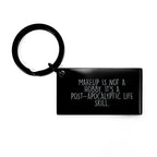 Funny Makeup Keychain Gifts from Men to Women for Makeup Enthusiasts on Christmas Unique Occasions Keychain with 'Makeup Is Not A Hobby. It's A Post-apocalyptic Life Skill.'