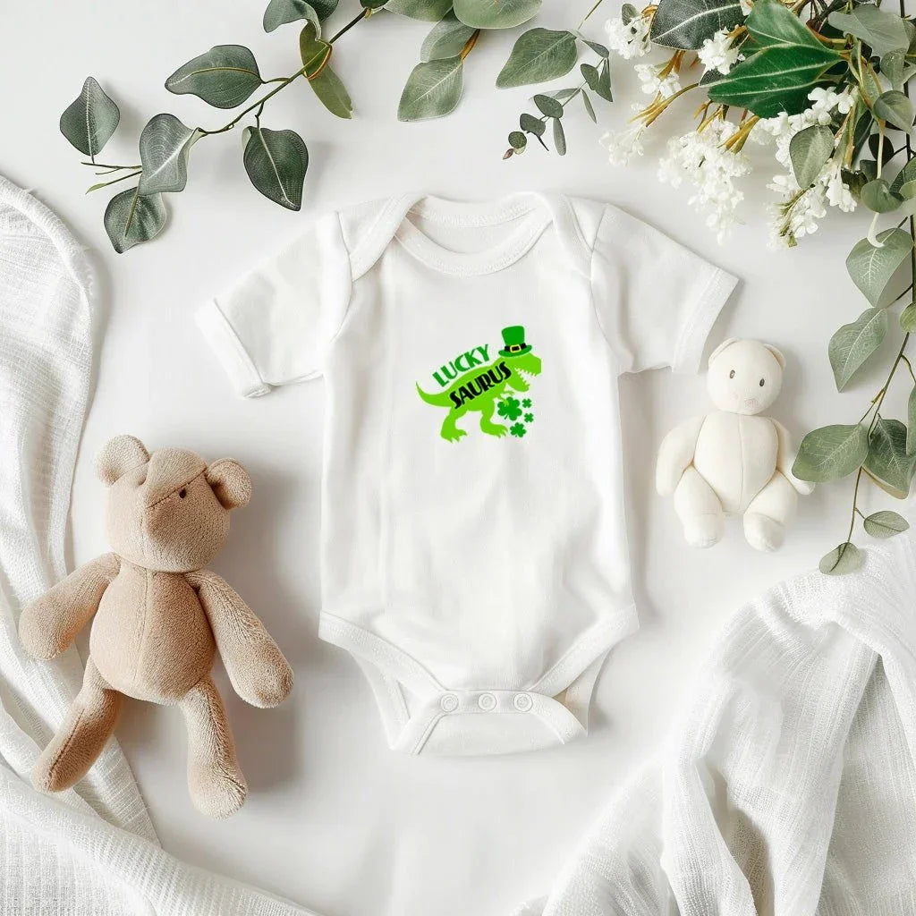 Luckysaurus St. Patrick’s Day Baby Bodysuit – Cute T-Rex Dinosaur Onesie – Soft Cotton Infant Romper – Funny Irish Holiday Outfit & Baby Gift