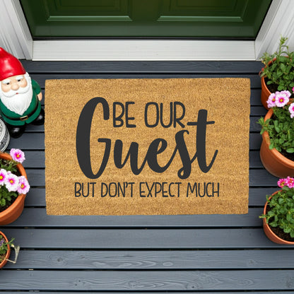 Be Our Guest But Don’t Expect Much Coir Doormat – Funny Welcome Mat | Rustic Farmhouse Front Porch Decor | Year-Round Entryway Rug - Mallard Moon