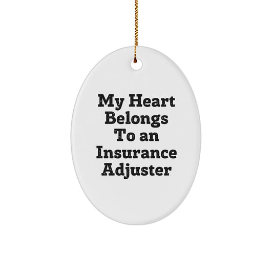 Funny Insurance Adjuster Gifts, Oval Ornament, Christmas Unique Presents for Insurance Adjuster Men Women Friends Family 'My Heart Belongs To An Insurance Adjuster' - Image 1